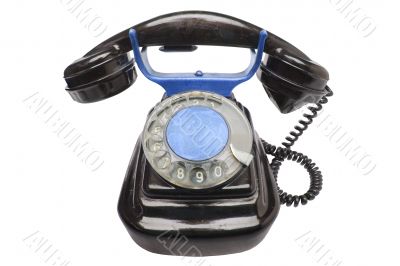 Old vintage black phone with disc dials with cliping path.