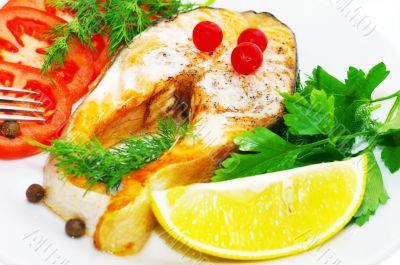 grilled fish with vegetables.