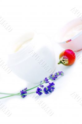 Closeup of open container of cosmetic face cream 