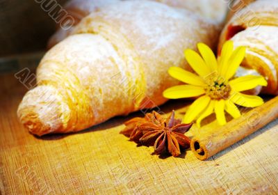 Some croissants on the wood texture