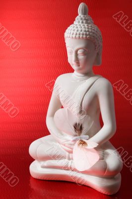 buddha figure with  a butterfly