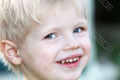 Young, happy blond boy