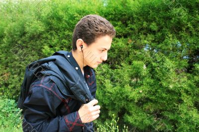 Teen with ear-phone