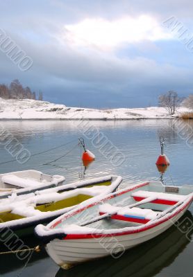 Boats Under Snow In Finland