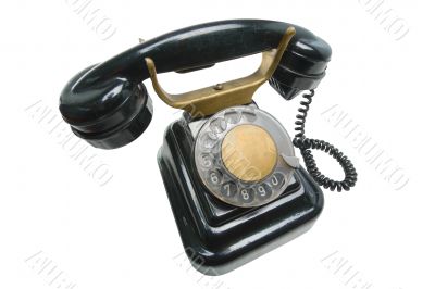 Old vintage black phone with disc dials with cliping path.