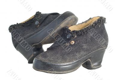 Old vintage traditional womans shoes isolated with clipping path.