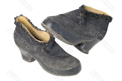 Old vintage traditional woman`s shoes isolated with clipping path.
