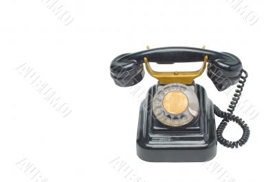 Old vintage black phone with disc dials with cliping path.