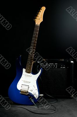 electric guitar and combo amplifier