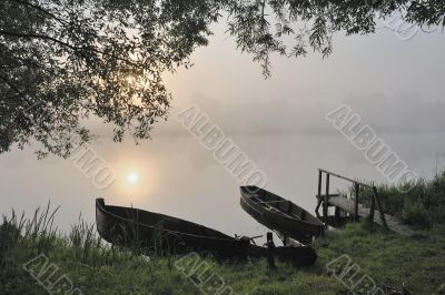 Boats at a sunrise