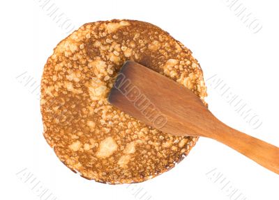 Pancake with a spatula