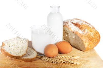 Milk, eggs, bread and wheat corn