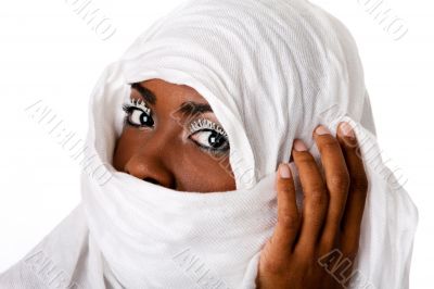 Female face in white scarf