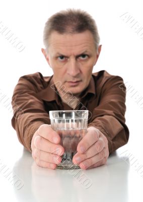 Man and glass with water.
