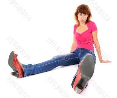 The young woman sitting on a floor