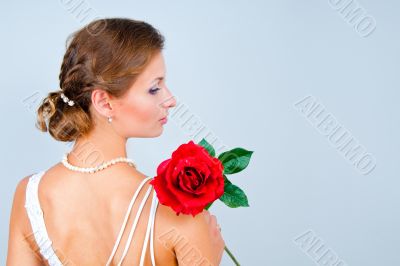 The bride with a red rose