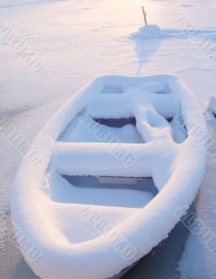 Boat Under Snow In Finland