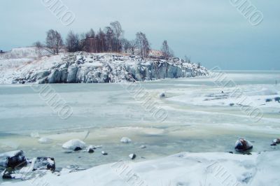 Frozen sea blue landscape with mountain in Finland