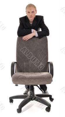 man and armchair 