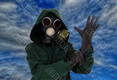 Gas mask, gloves, the person
