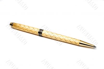 Gold ball-point pen. Isolated on a white background.