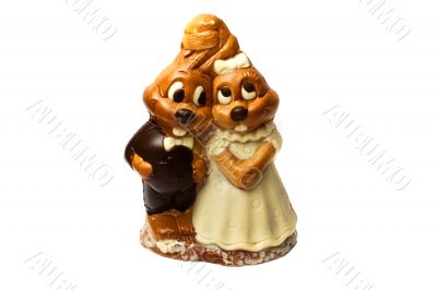 Couple of chocolate rabbits. Isolated on a white background.