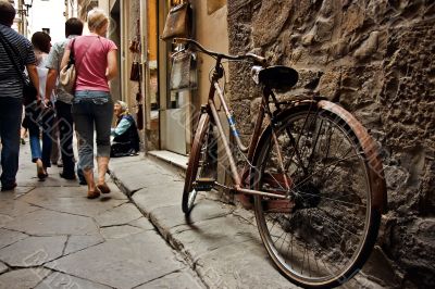 Old bicycle on the florence sreeet. Italy.