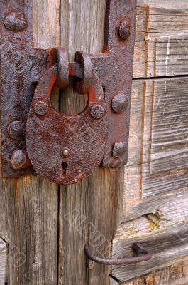 Rusty Padlock on the Gate