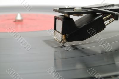 Needle on vinyl disk