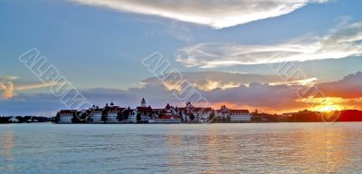 Sunset, lake and buildings