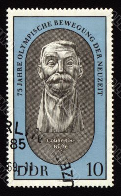 Postage stamp from GDR with Pierre de Coubertin
