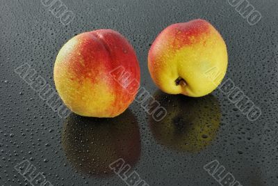 Nectarines on a dark background