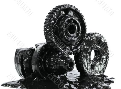 Gears soiled with black oil
