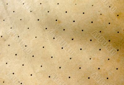 Texture of old paper with dots. 