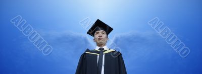 Asian male graduate with angel wings