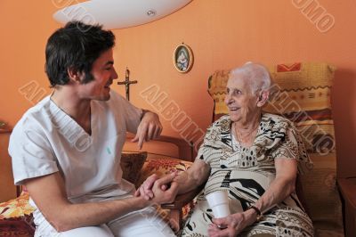 male nurse and senior woman