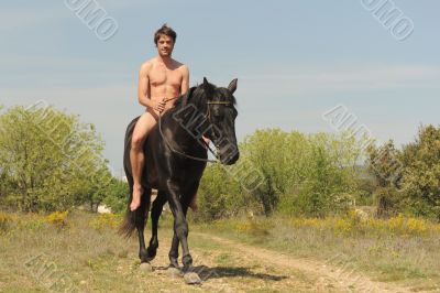 naked man and stallion