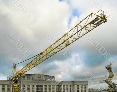 The crane against clouds