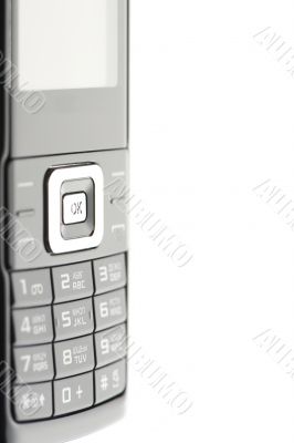 Black mobile phone isolated on white macro