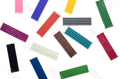 Colored plasticine isolated on white background