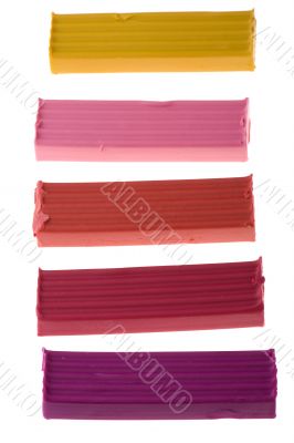 Colored plasticine on white