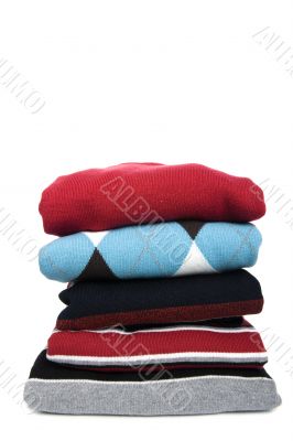 Colored sweater on white background