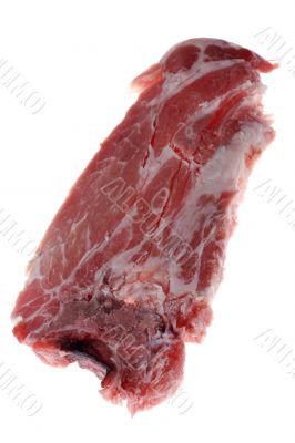Cutting pork on white macro