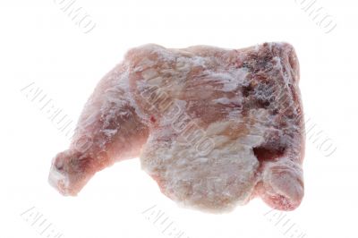 Frozen chicken leg on white