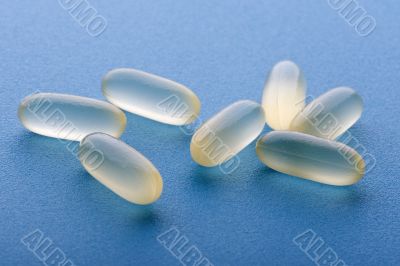 group pill on blue close up