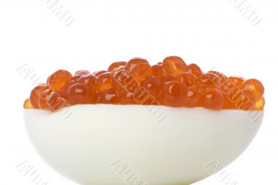 Red caviar on egg