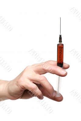 syringe on hand on white