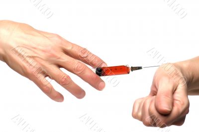 syringe on hand on white background