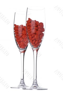 tablet in wine glass on white