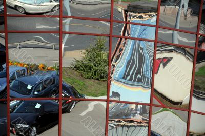 Distorted Reflection of Cars and Buildings